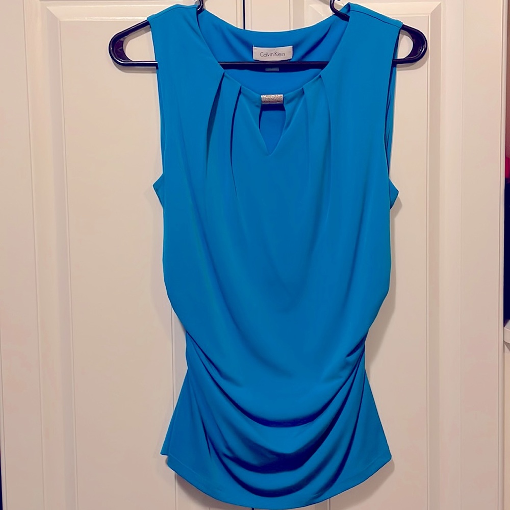 Calvin Klein blue women’s dress shirt.